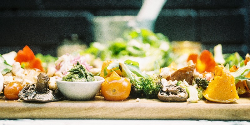 food waste on a wooden tray
