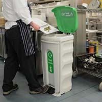 Big white food recycling bin with green stickers