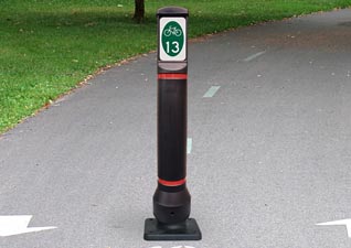 Glasdon, Inc. bolt down Neopolitan Signhead bollard with bicycle route sign face