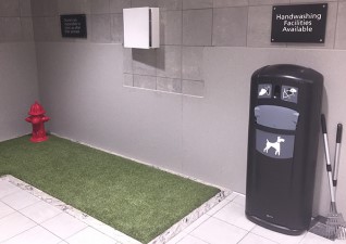 Retriever City™ 9G Pet Waste Station with bag dispenser at BWI Airport animal relief area