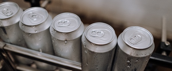 A line of aluminum cans ready for processing