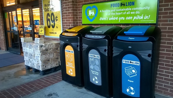 Lion personalized recycling bins outside their store