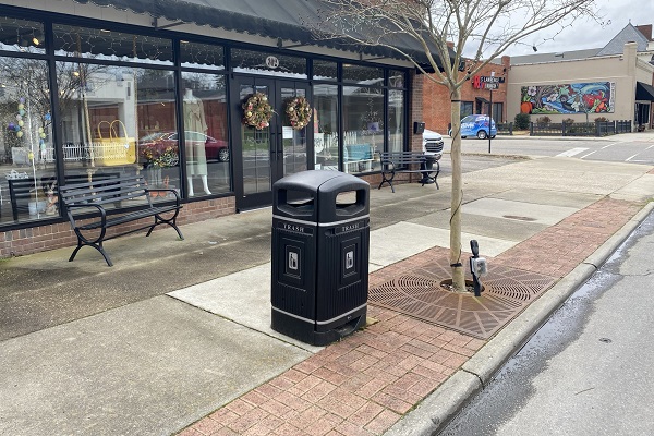 Jubilee trash can in front of a shop, Rockingham