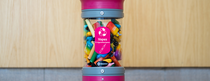 Disposable Vapes in a Glasdon C-Thru 5Q Vape Recycling Collection Tube