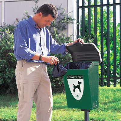 Fido pet waste station in deep green with 'PET WASTE ONLY' decal
