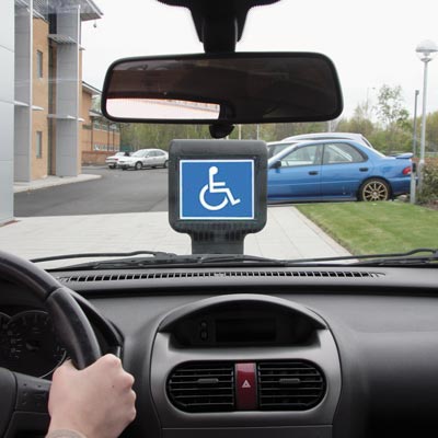 Infomaster bollard is visible through a car windshield